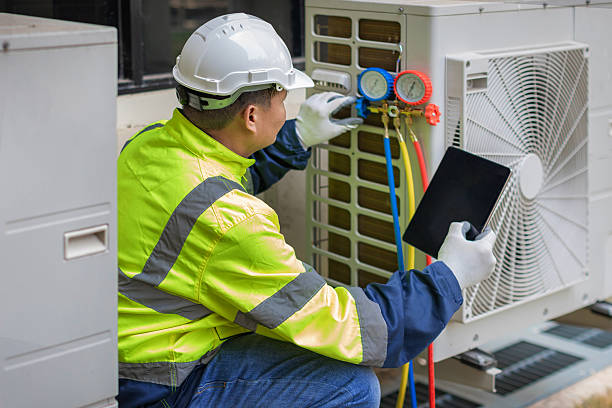 Professional Air Conditioning Repair technician working in Bascom, FL